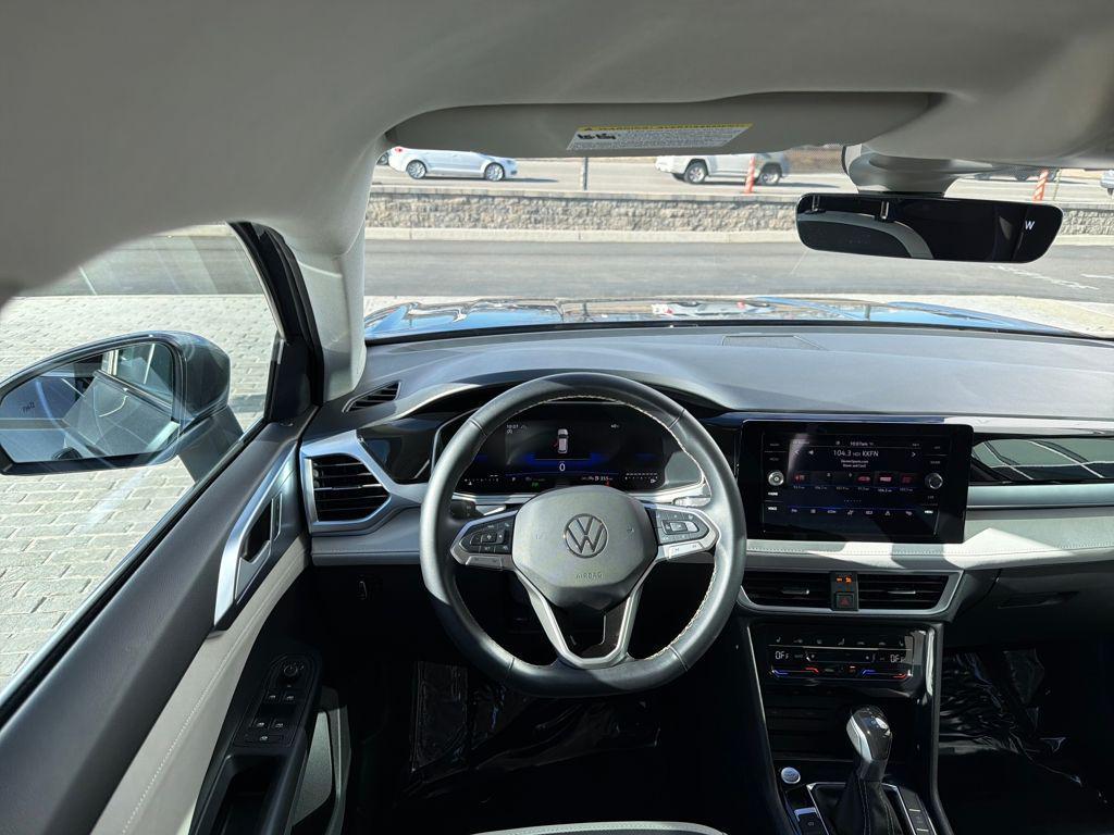 used 2025 Volkswagen Taos car, priced at $25,377