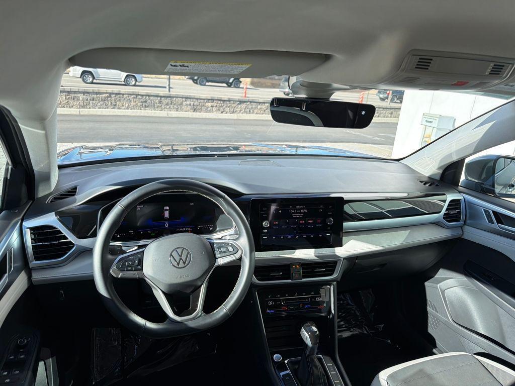 used 2025 Volkswagen Taos car, priced at $25,377