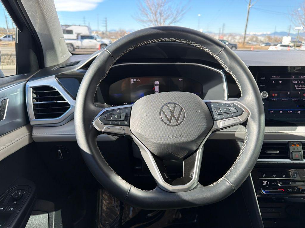 used 2025 Volkswagen Taos car, priced at $25,377