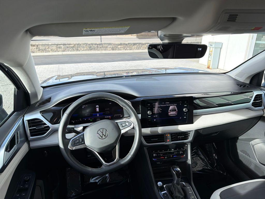 used 2025 Volkswagen Taos car, priced at $25,179