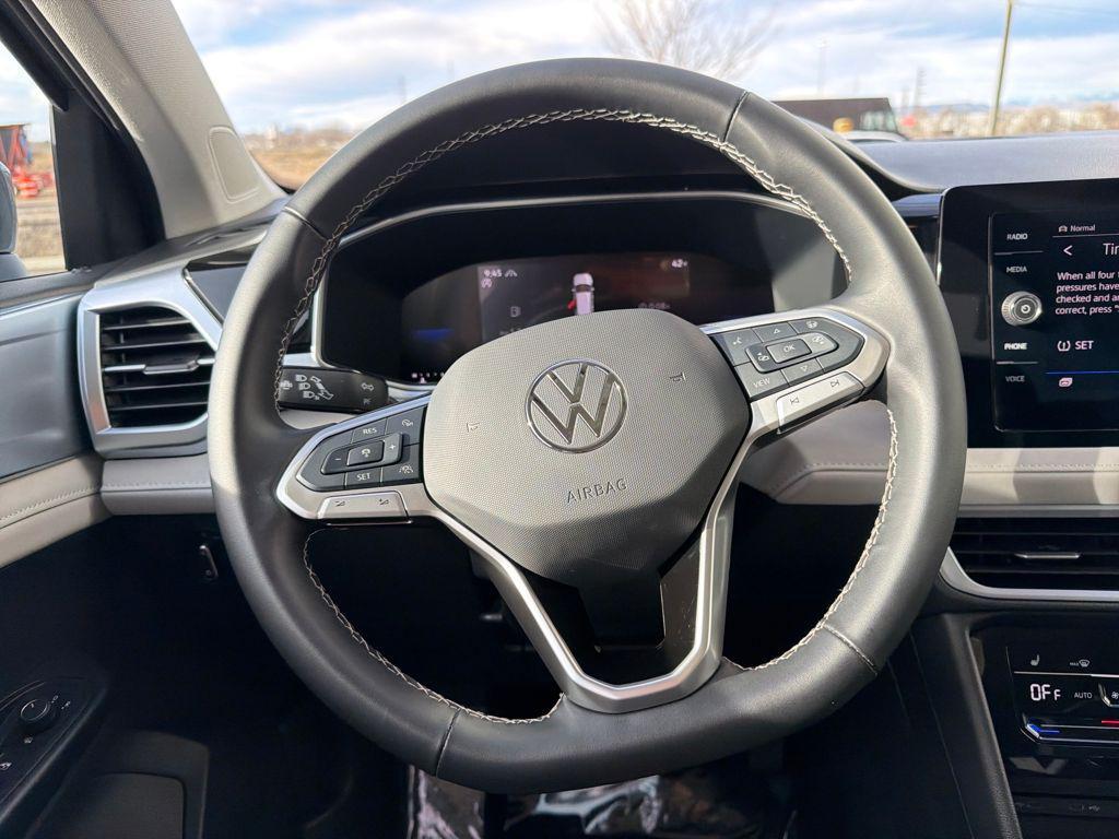 used 2025 Volkswagen Taos car, priced at $25,179