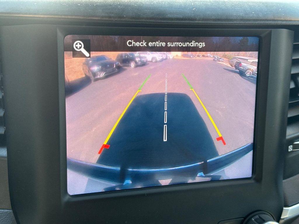 used 2021 Ram 1500 car, priced at $24,988