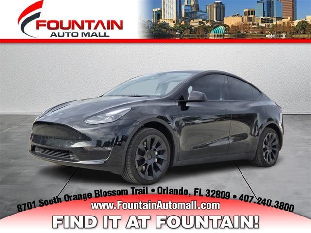 used 2025 Tesla Model Y car, priced at $35,997