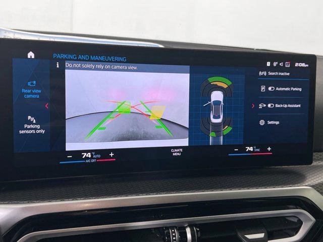 used 2024 BMW M2 car, priced at $68,913