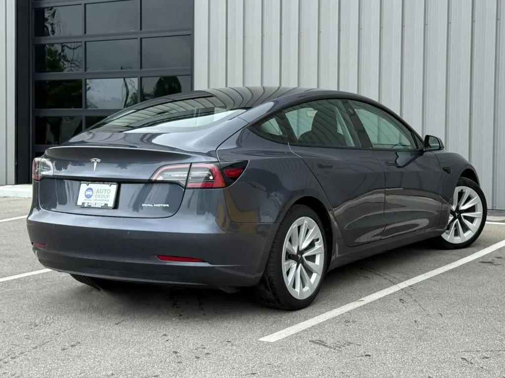 used 2022 Tesla Model 3 car, priced at $27,475