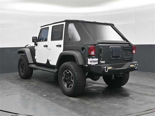 used 2015 Jeep Wrangler Unlimited car, priced at $24,959