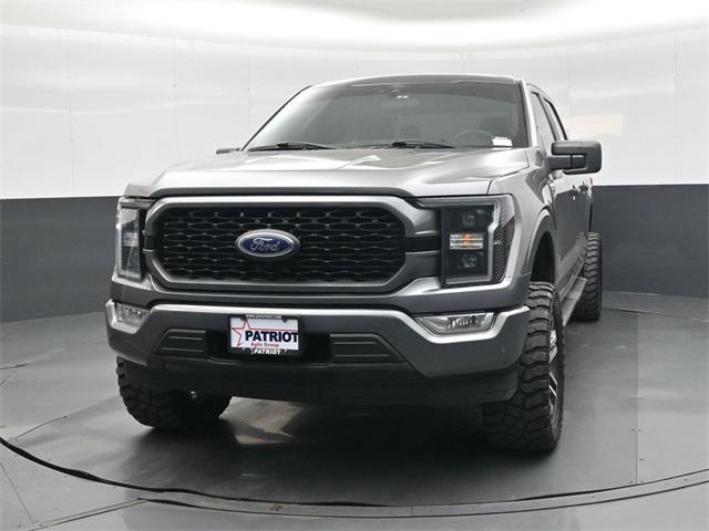 used 2021 Ford F-150 car, priced at $25,000