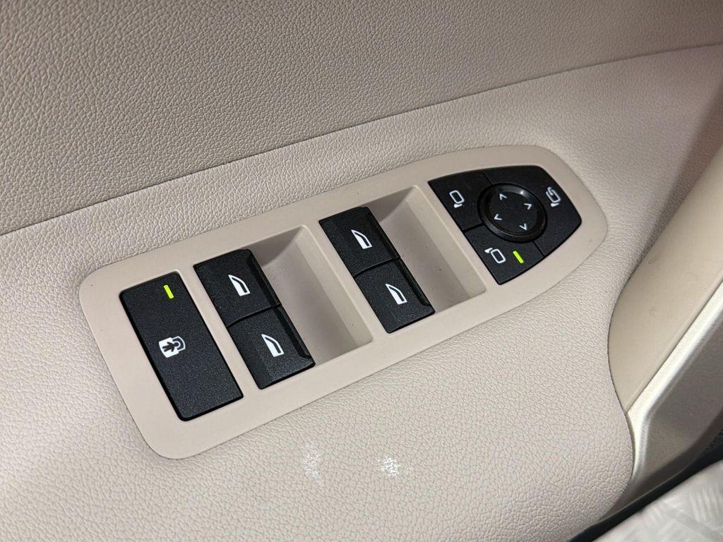 used 2024 BMW iX car, priced at $54,689