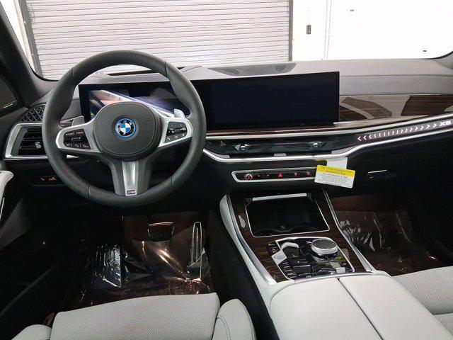 new 2026 BMW X5 PHEV car, priced at $84,475