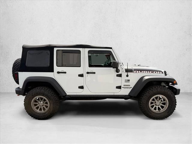 used 2017 Jeep Wrangler Unlimited car, priced at $23,354