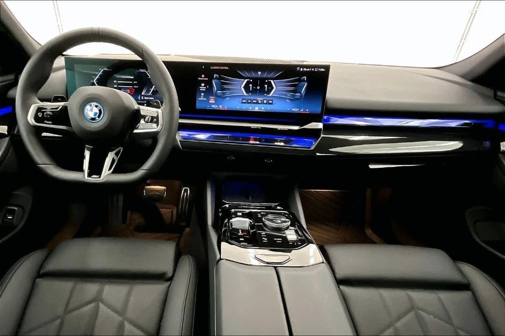 used 2025 BMW 550e car, priced at $74,625