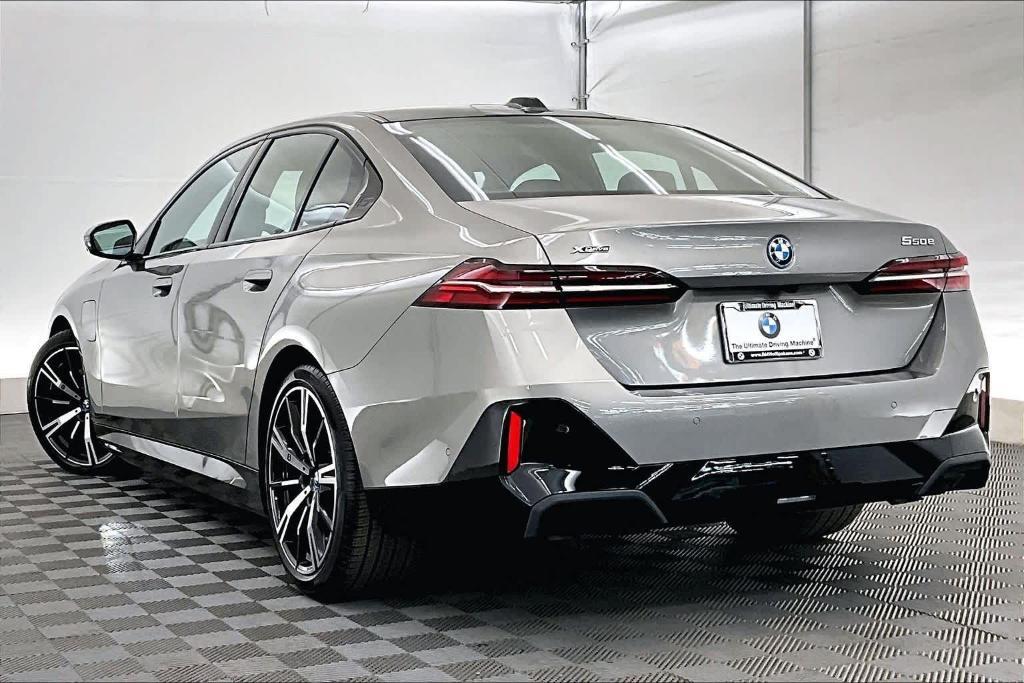 used 2025 BMW 550e car, priced at $74,625