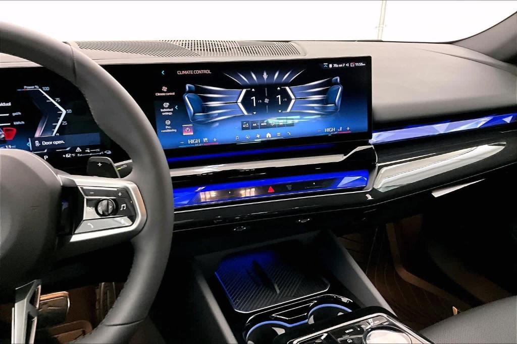 used 2025 BMW 550e car, priced at $74,625