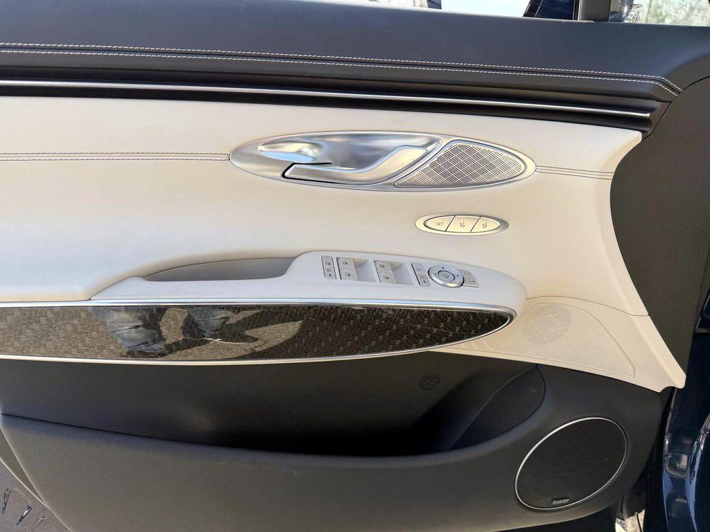 used 2023 Genesis GV70 car, priced at $43,239