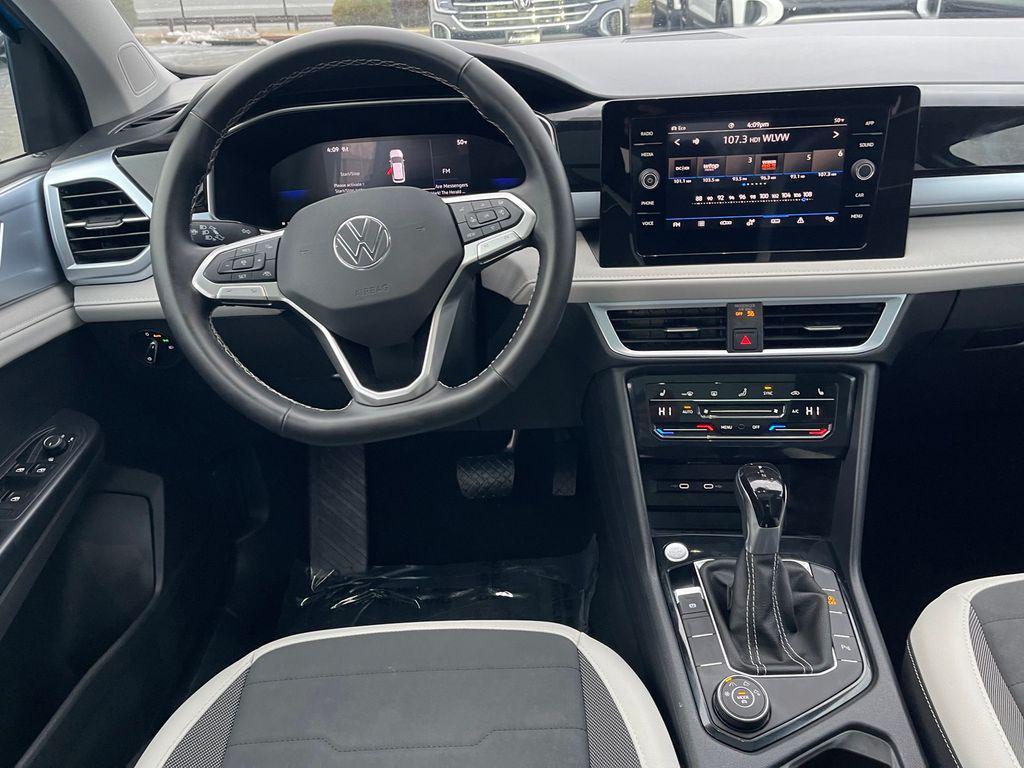 used 2025 Volkswagen Taos car, priced at $26,991