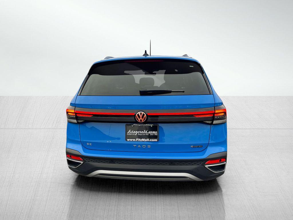 used 2025 Volkswagen Taos car, priced at $26,991