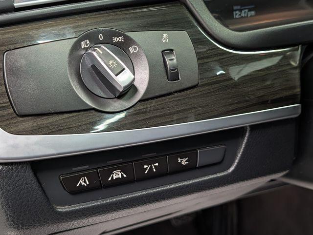 used 2014 BMW M5 car, priced at $25,991