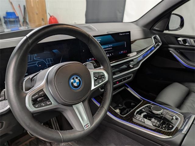 used 2025 BMW X5 PHEV car, priced at $68,733