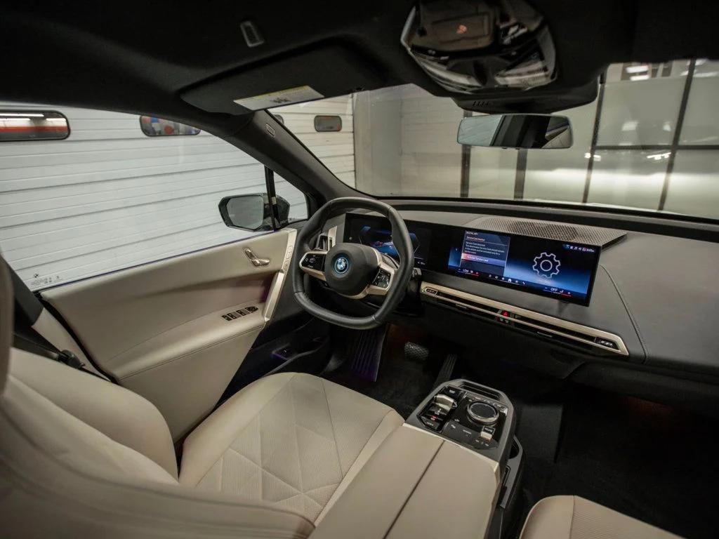 used 2024 BMW iX car, priced at $54,996
