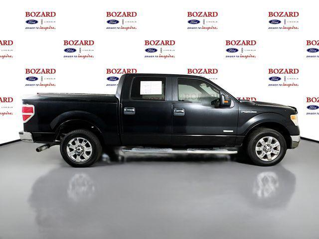 used 2014 Ford F-150 car, priced at $14,000