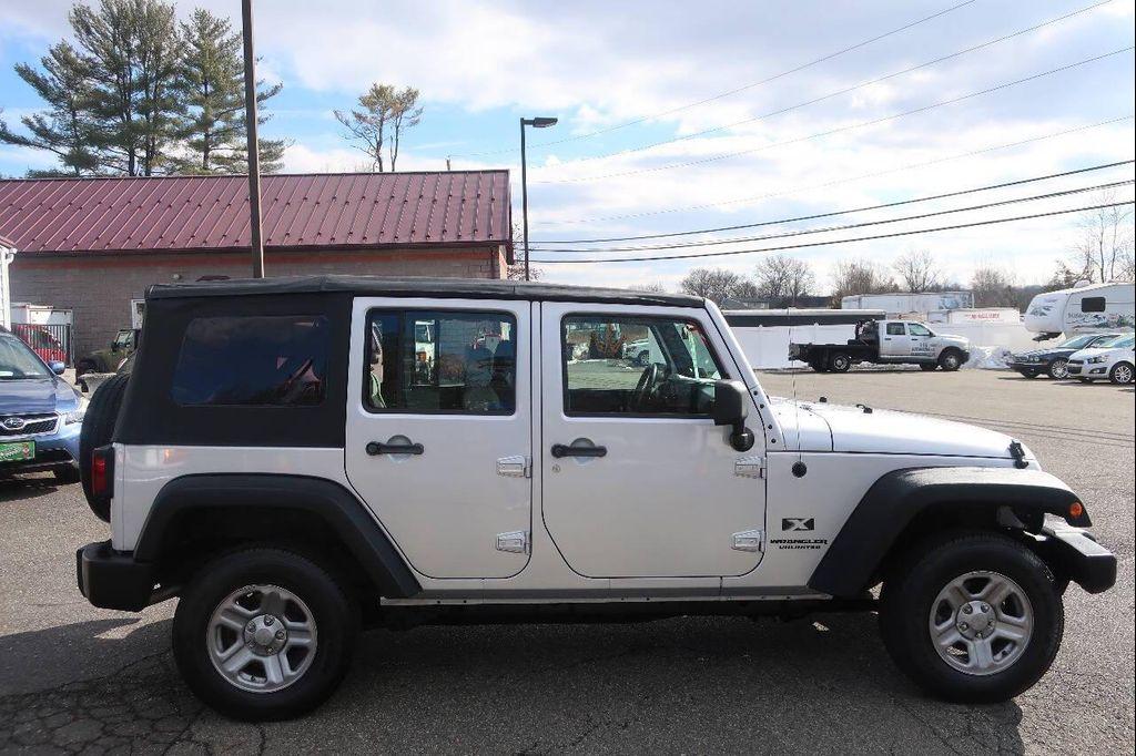 used 2009 Jeep Wrangler Unlimited car, priced at $17,999