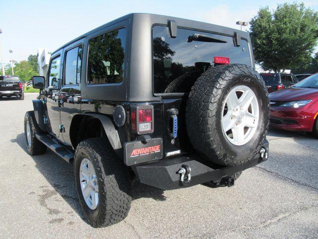 used 2014 Jeep Wrangler Unlimited car, priced at $14,231