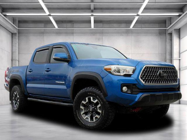used 2018 Toyota Tacoma car, priced at $23,477