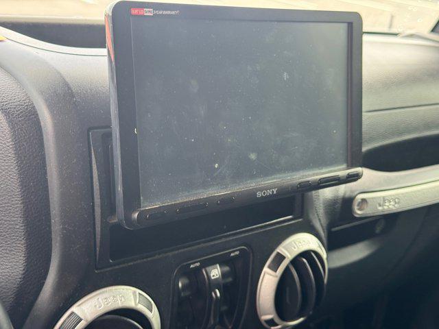 used 2016 Jeep Wrangler Unlimited car, priced at $21,999