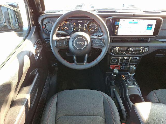 used 2024 Jeep Wrangler car, priced at $38,106
