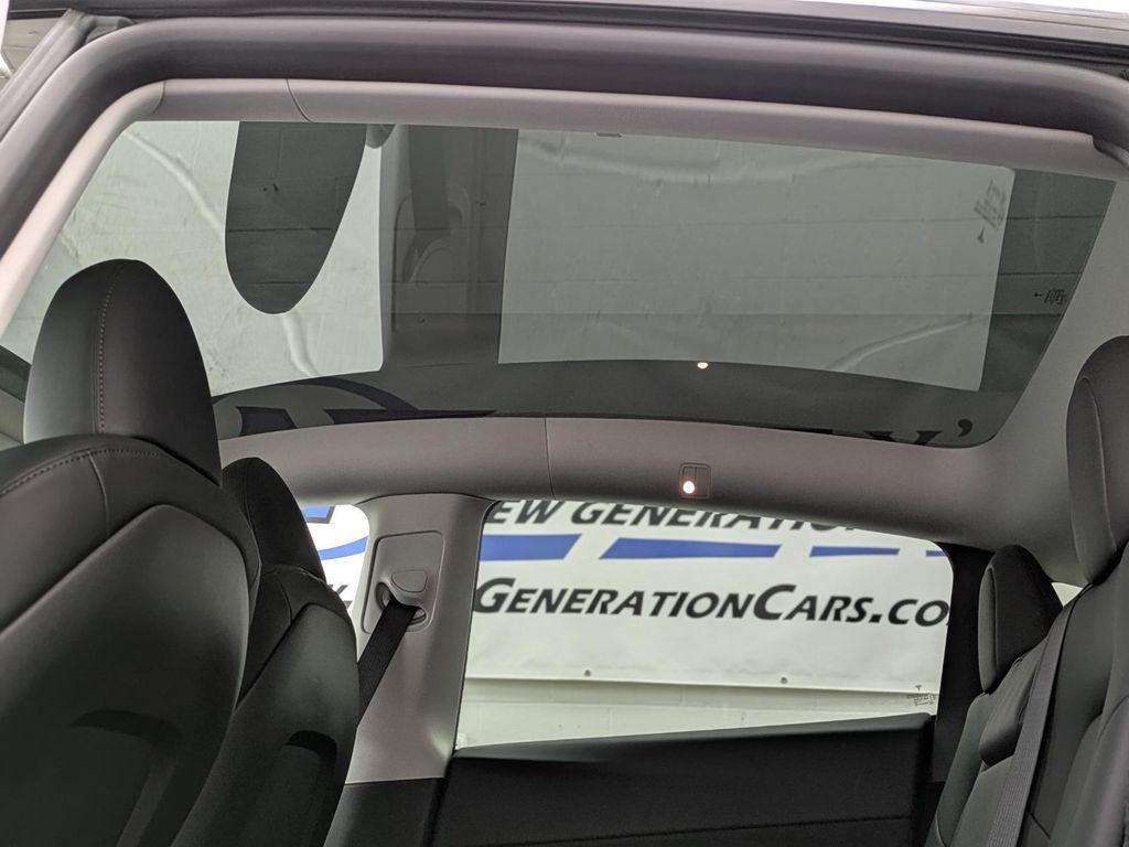 used 2023 Tesla Model Y car, priced at $33,249