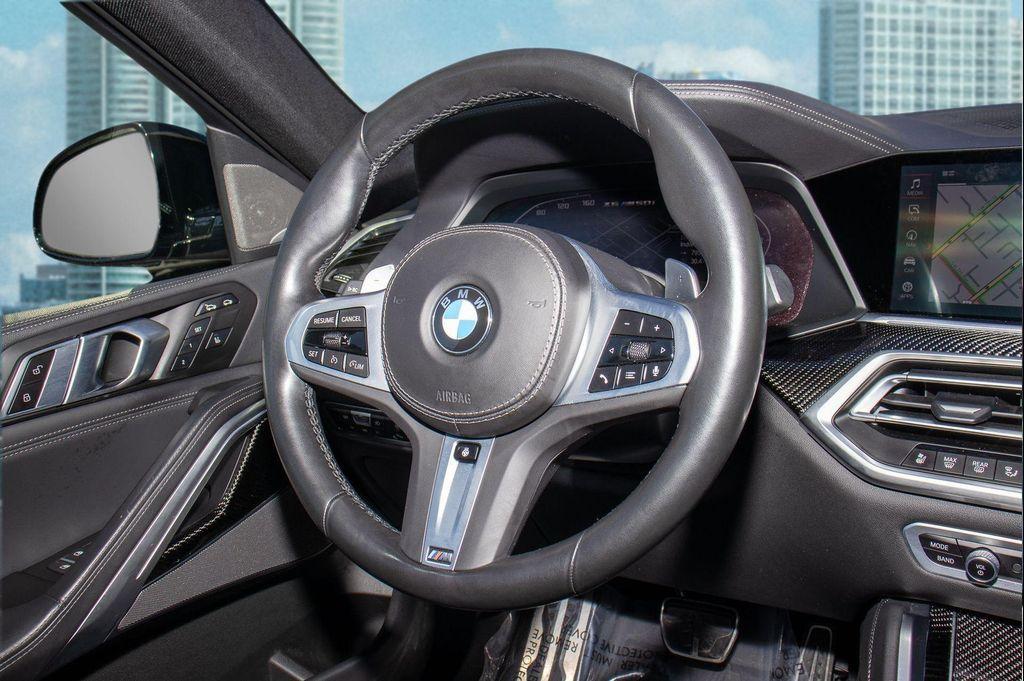 used 2023 BMW X6 car, priced at $51,900