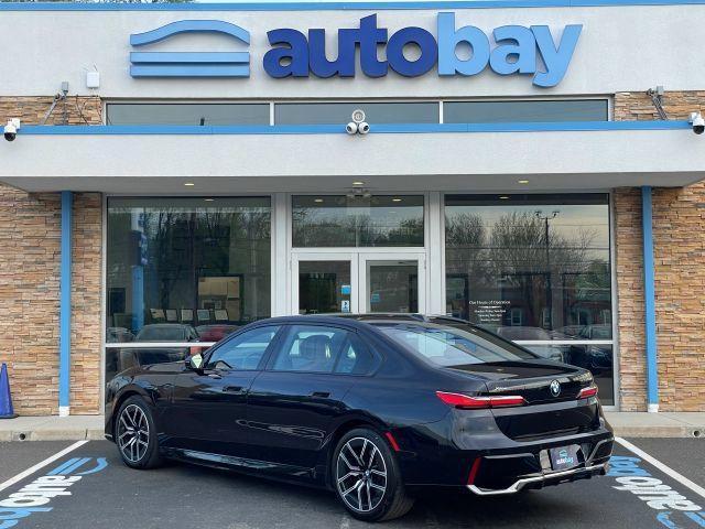 used 2024 BMW 750e car, priced at $72,850