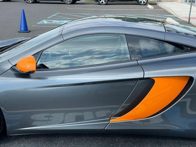 used 2012 McLaren MP4-12C car, priced at $103,600