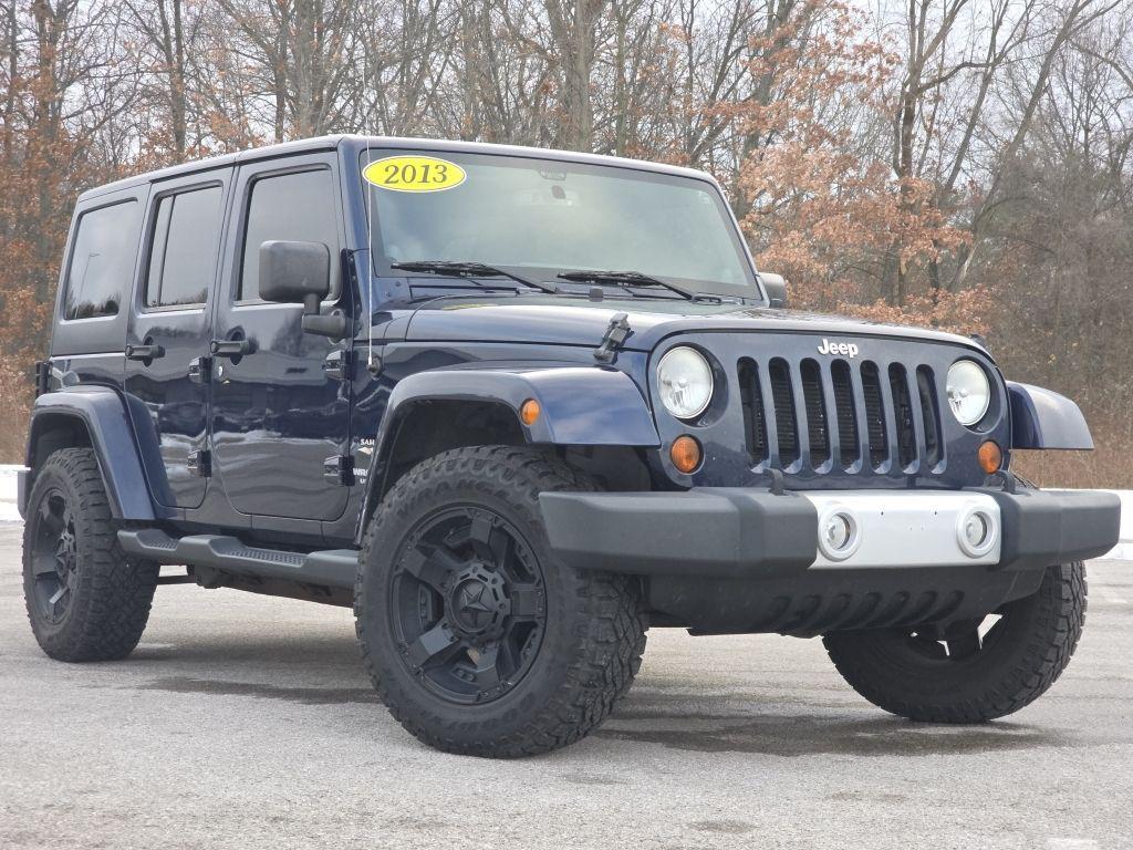 used 2013 Jeep Wrangler Unlimited car, priced at $11,700