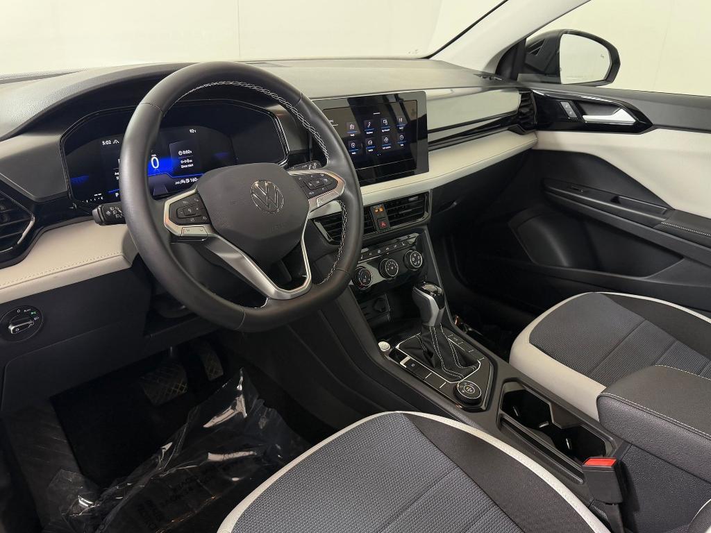 used 2025 Volkswagen Taos car, priced at $23,298