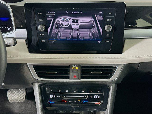 used 2025 Volkswagen Taos car, priced at $22,496