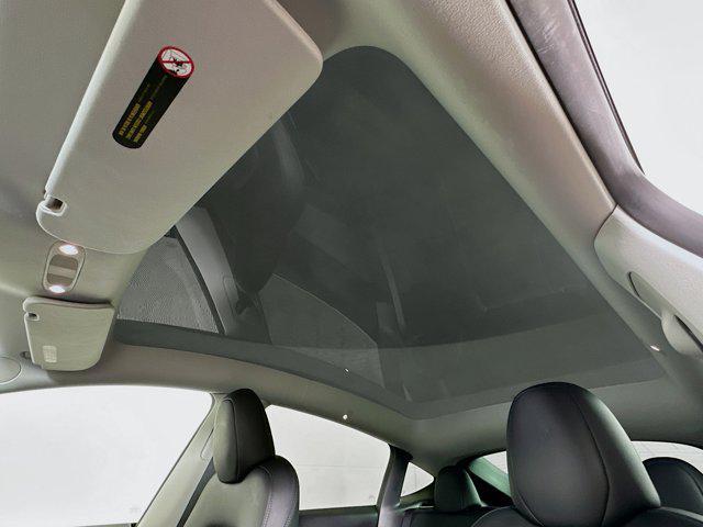 used 2024 Tesla Model Y car, priced at $29,996