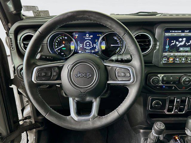 used 2023 Jeep Wrangler 4xe car, priced at $27,496