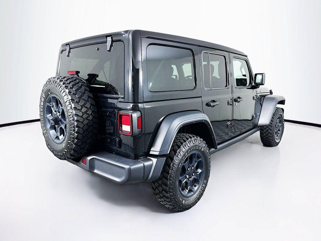 used 2023 Jeep Wrangler 4xe car, priced at $28,618