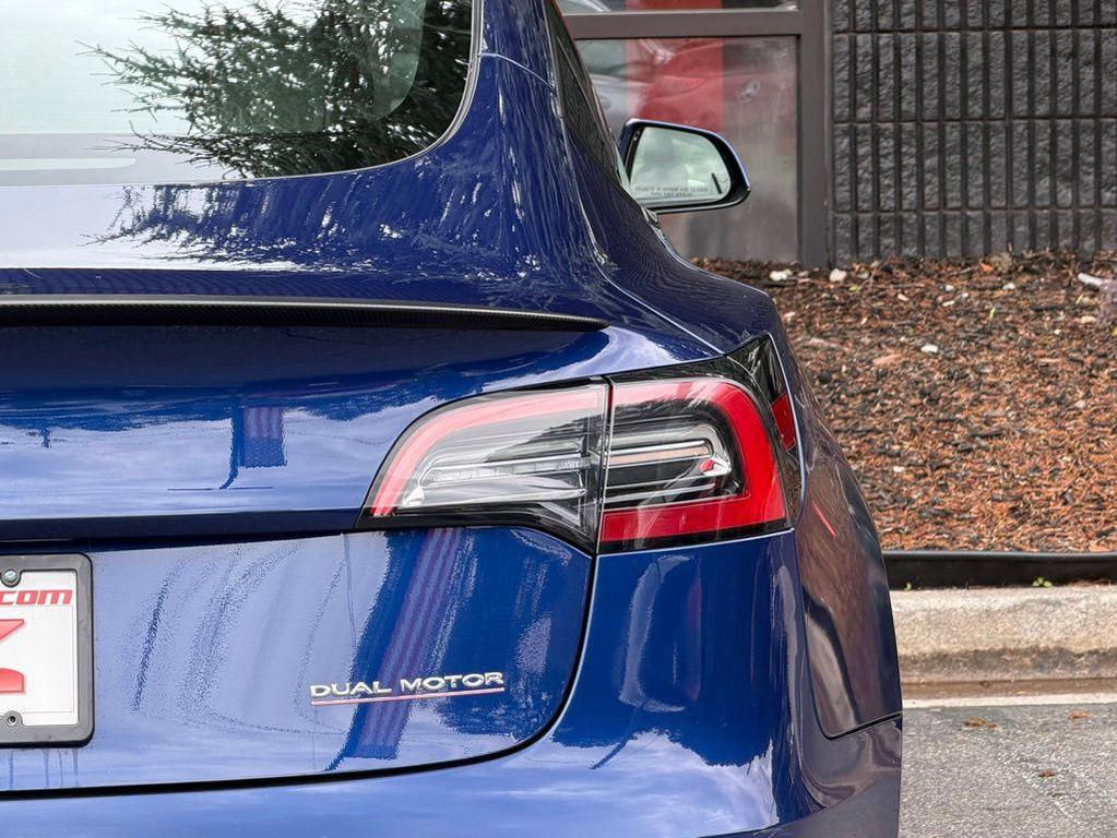 used 2023 Tesla Model 3 car, priced at $33,985