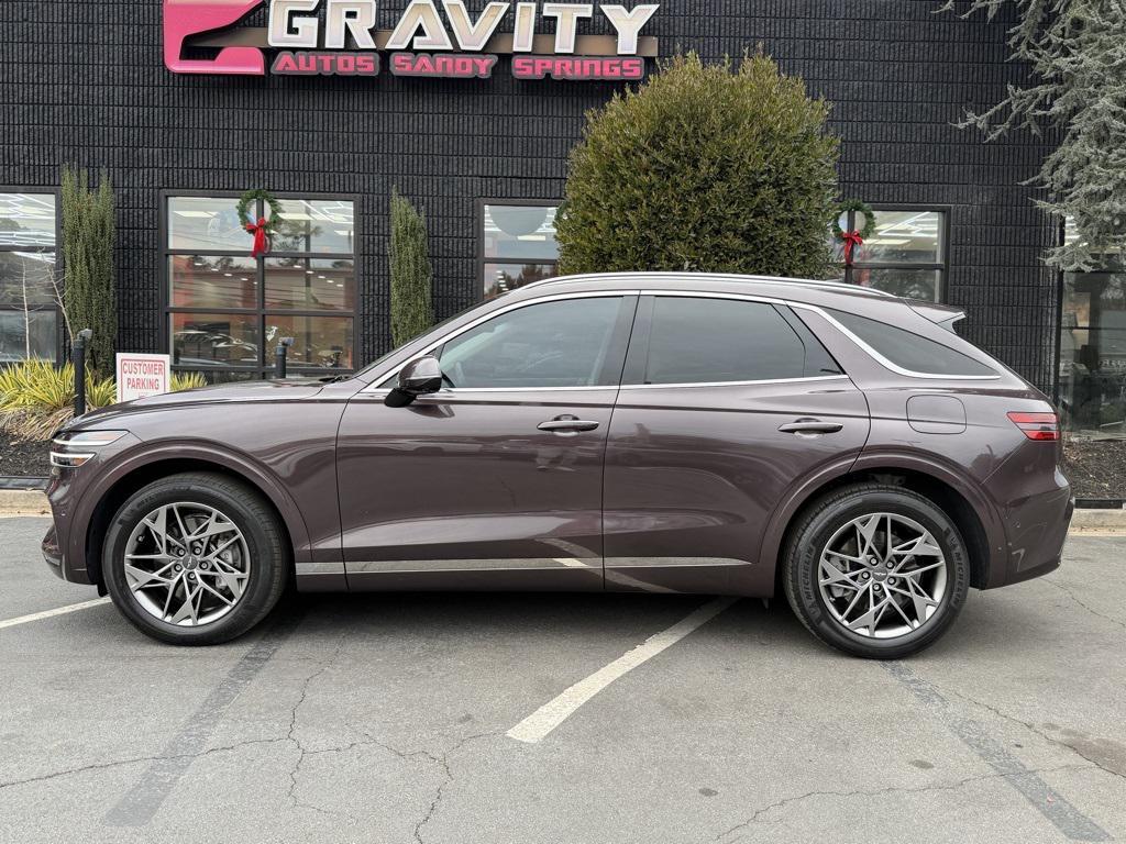 used 2023 Genesis GV70 car, priced at $34,859