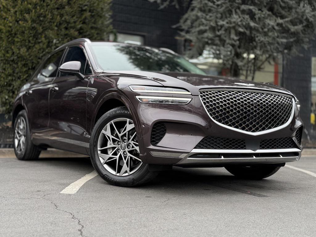 used 2023 Genesis GV70 car, priced at $34,859
