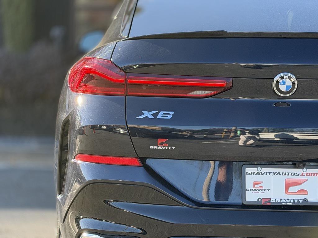 used 2023 BMW X6 car, priced at $45,895
