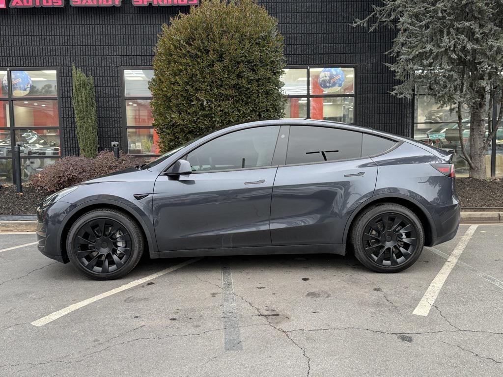 used 2024 Tesla Model Y car, priced at $32,895