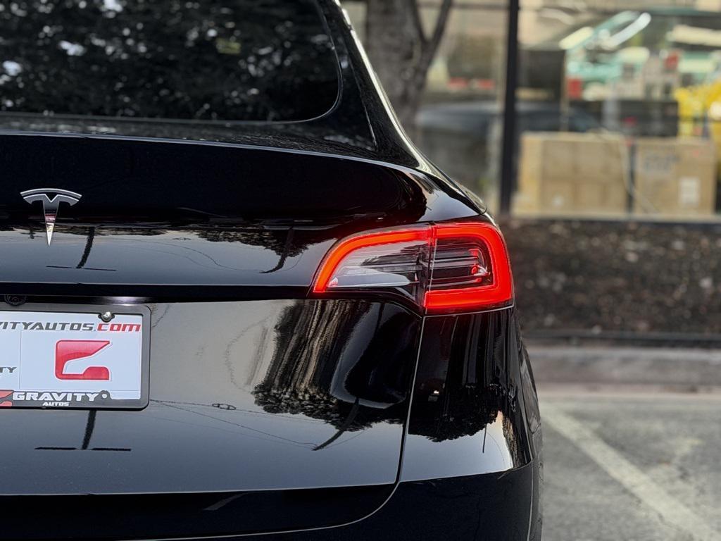 used 2024 Tesla Model Y car, priced at $31,895