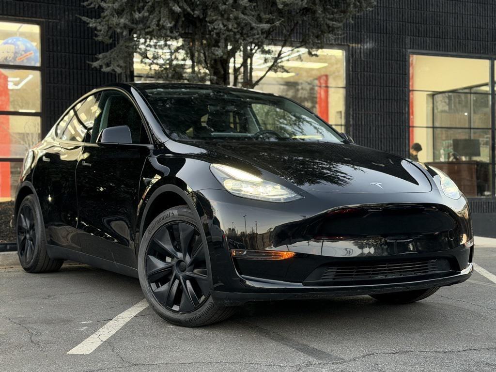 used 2024 Tesla Model Y car, priced at $31,895
