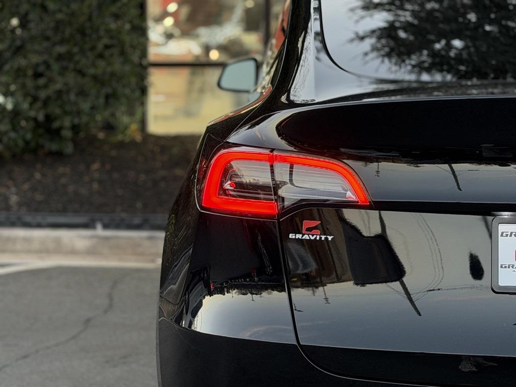 used 2024 Tesla Model Y car, priced at $31,895