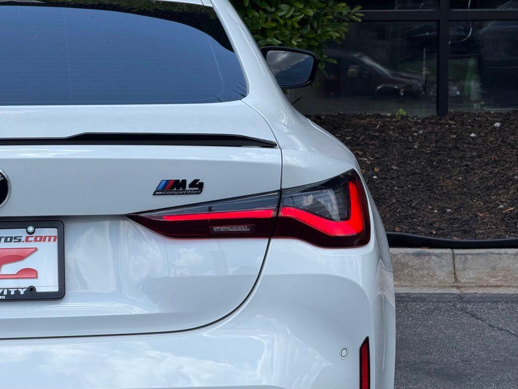 used 2024 BMW M4 car, priced at $79,895
