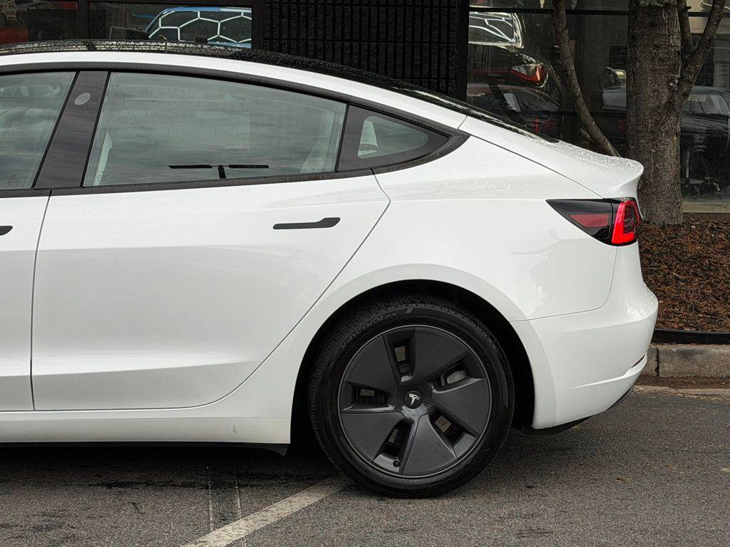 used 2023 Tesla Model 3 car, priced at $28,495