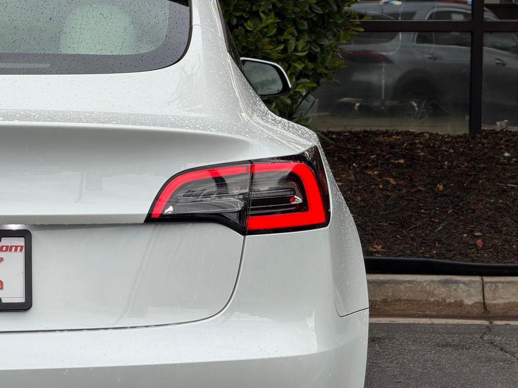 used 2023 Tesla Model 3 car, priced at $28,495